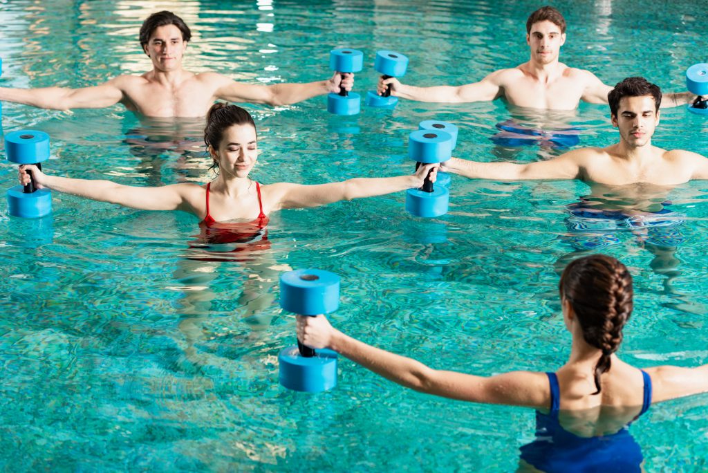 water aerobics students working out