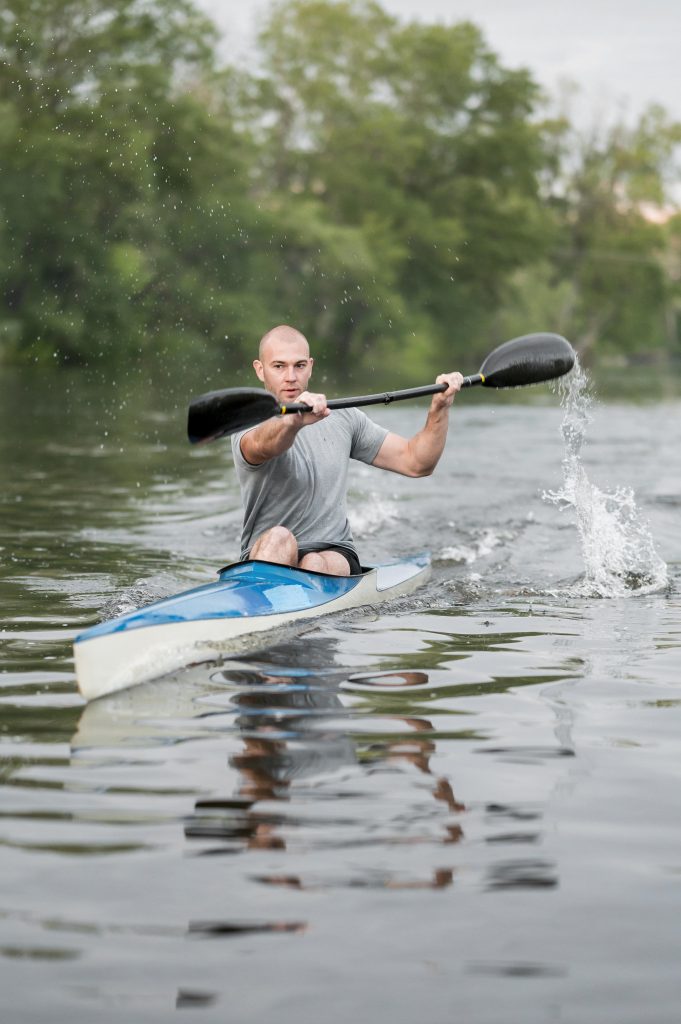 Man rowing kayak