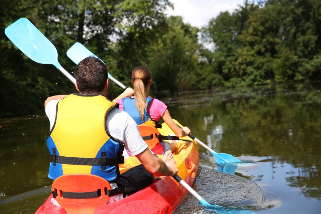 couple on 2 person kayak