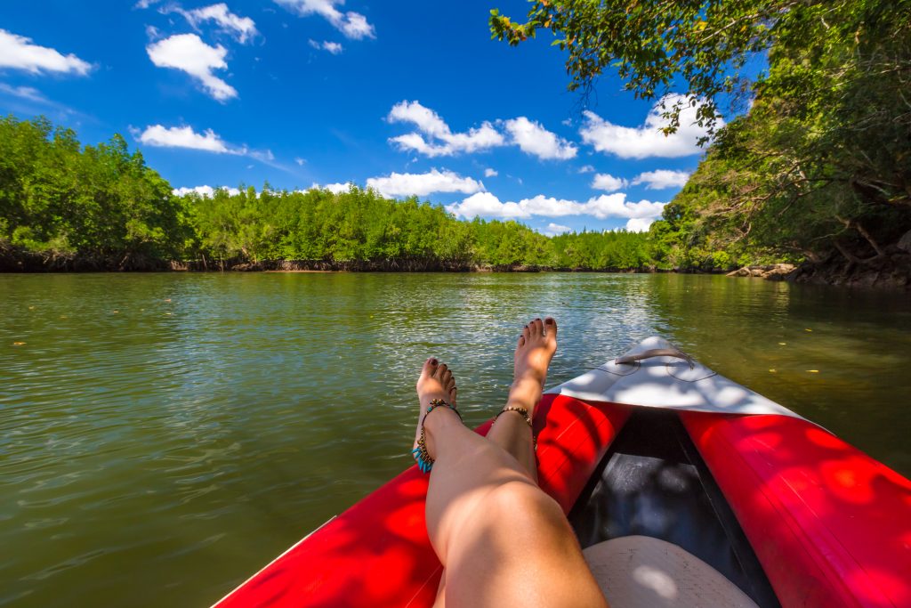 woman relaxing in kayak