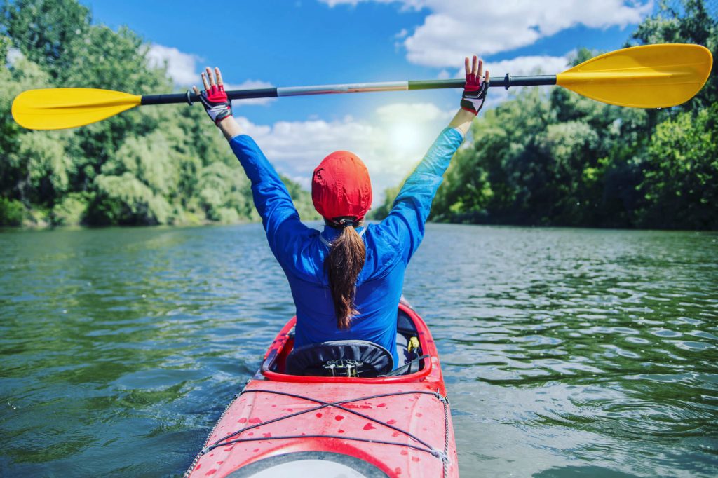 woman happy kayaking