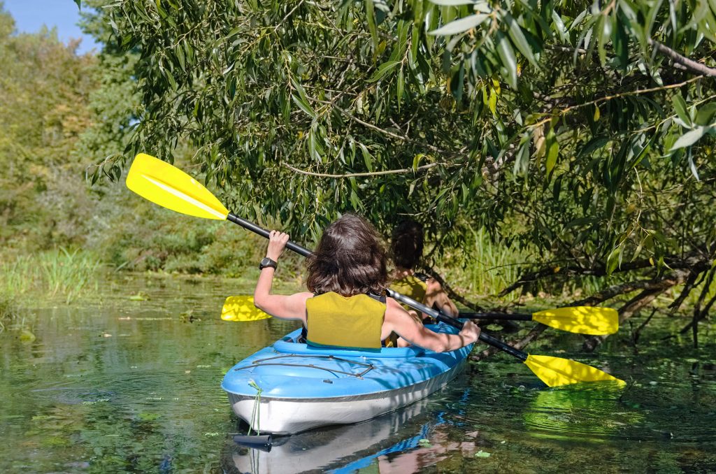 mom and child kayaking