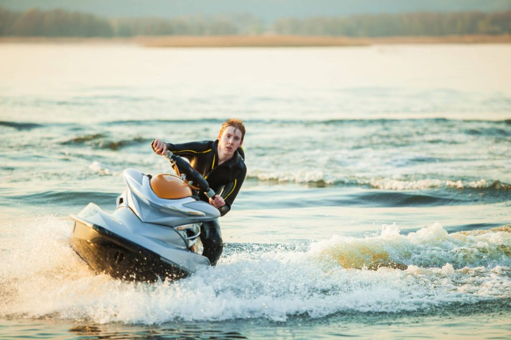 man riding a jet ski